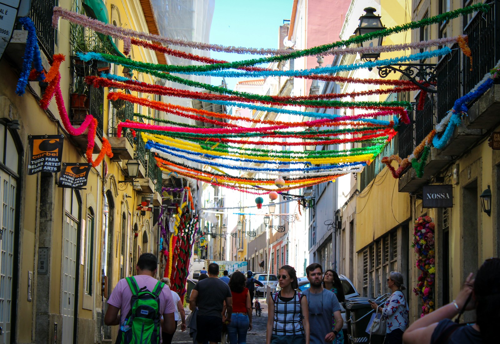 Photo by Alano Oliveira people walking on street during daytime