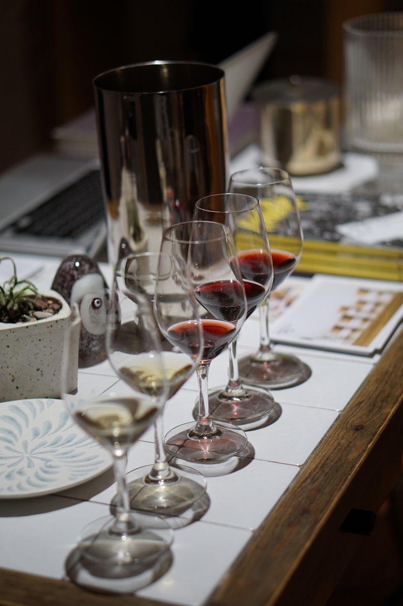 Photo by Makis Panagopoulos a group of wine glasses on a table