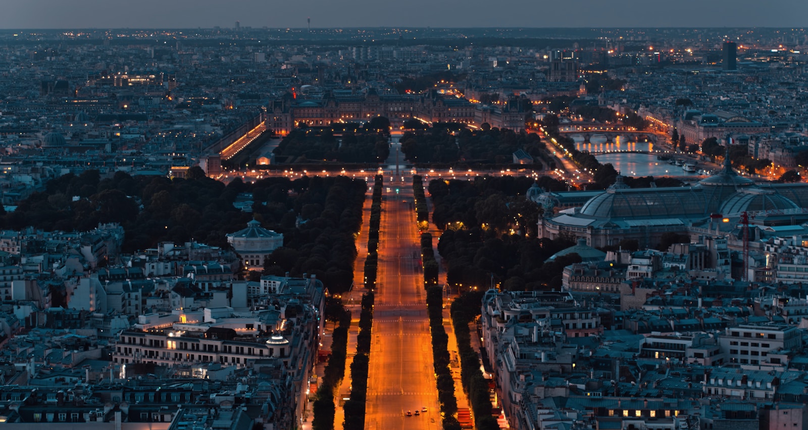 an aerial view of the eiffel tower at night